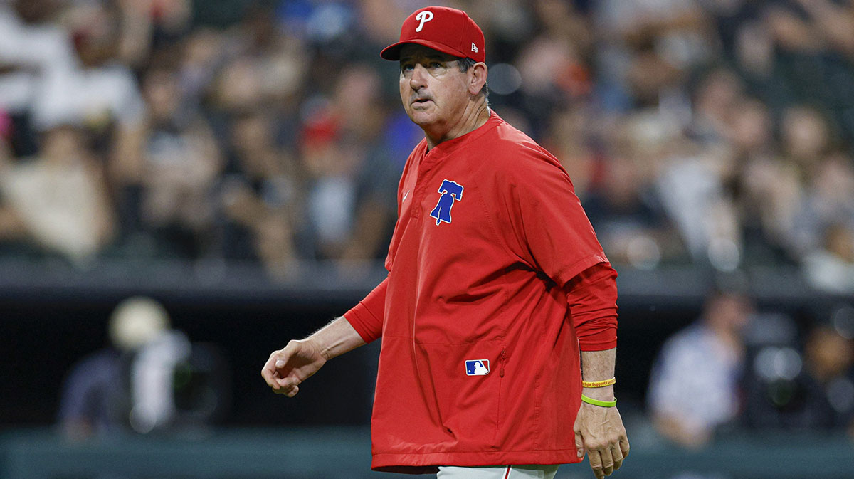 Philadelphia Phillies manager Rob Thomson (59) walks back to the dugout during the seventh inning of baseball game against the Chicago White Sox at Rate Field.