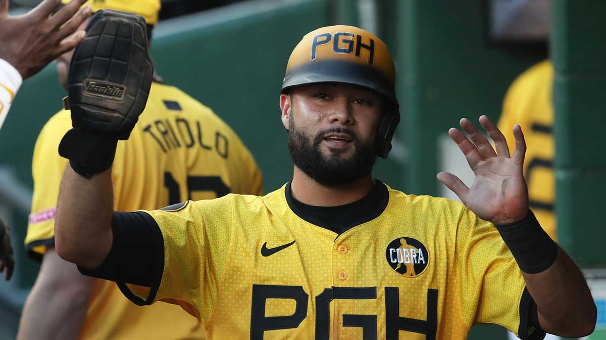 Pittsburgh Pirates third baseman Isiah Kiner-Falefa (7) celebrates in the dugout after scoring a run against the Colorado Rockies during the second inning at PNC Park.