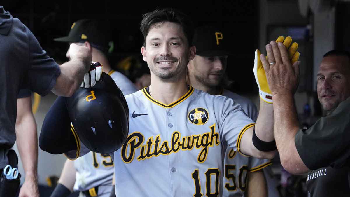 Pittsburgh Pirates outfielder Bryan Reynolds (10) celebrates in the dugout after hitting a home run against the Milwaukee Brewers in the sixth inning at American Family Field.