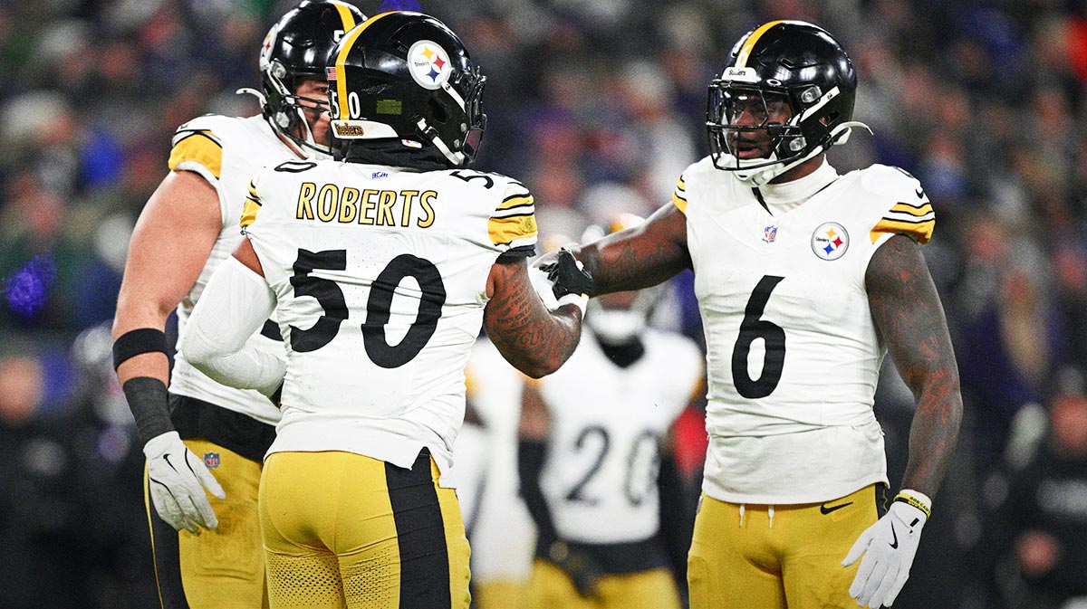 Pittsburgh Steelers linebacker Elandon Roberts (50) and linebacker Patrick Queen (6) react after a tackle in the second quarter against the Baltimore Ravens in an AFC wild card game at M&T Bank Stadium.