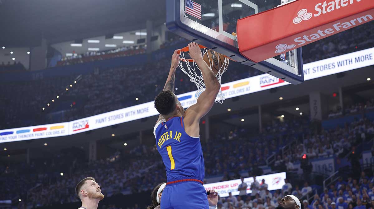 Denver Nuggets forward Michael Porter Jr. (1) dunks against the Oklahoma City Thunder during the first quarter of game five of the second round for the 2025 NBA Playoffs at Paycom Center.