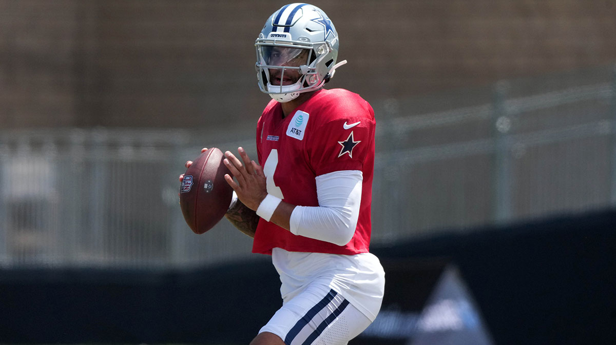 Dallas Cowboys quarterback Dak Prescott (4) throws the ball at training camp at the River Ridge Fields