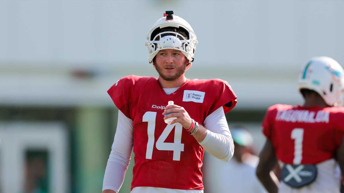 Miami Dolphins quarterback Quinn Ewers (14) hydrates during training camp at Baptist Health Training Complex.