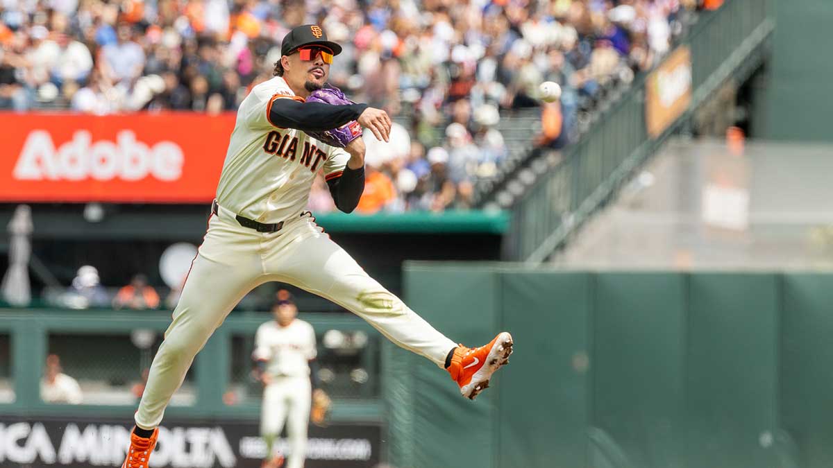 San Francisco Giants shortstop Willy Adames (2) makes an out at first during the fourth inning against the San Diego Padres at Oracle Park.