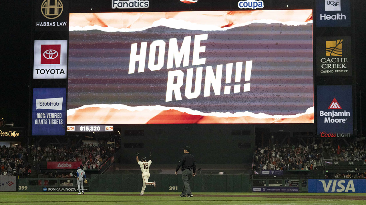 San Francisco Giants designated hitter Rafael Devers (16) celebrates while running the bases after hitting a home run during the sixth inning against the Chicago Cubs at Oracle Park.