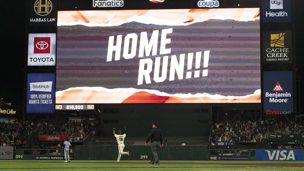 San Francisco Giants designated hitter Rafael Devers (16) celebrates while running the bases after hitting a home run during the sixth inning against the Chicago Cubs at Oracle Park.