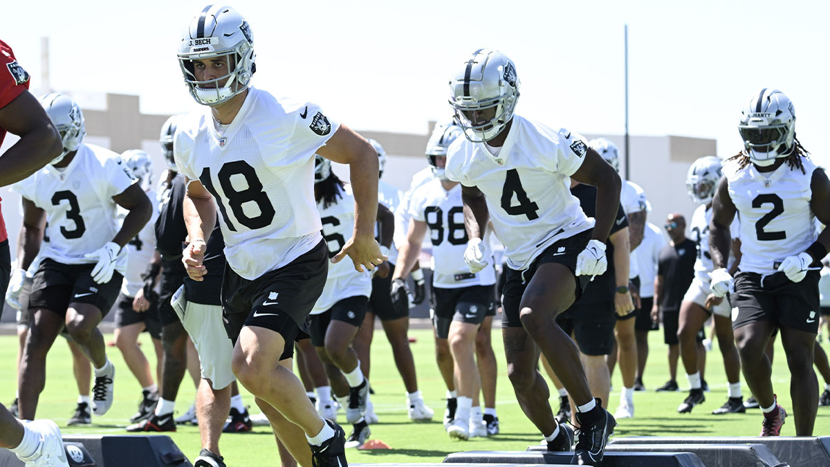 Las Vegas Raiders wide receiver Jack Bech (18) and wide receiver Shedrick Jackson (4) perform a drill during Las Vegas Raiders Minicamp at Intermountain Health Performance Center.