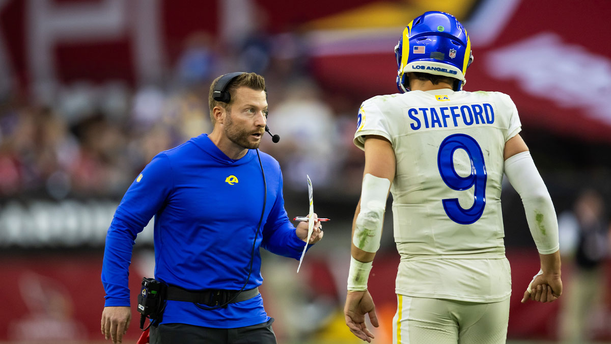 Los Angeles Rams head coach Sean McVay talks with quarterback Matthew Stafford (9) against the Arizona Cardinals at State Farm Stadium.