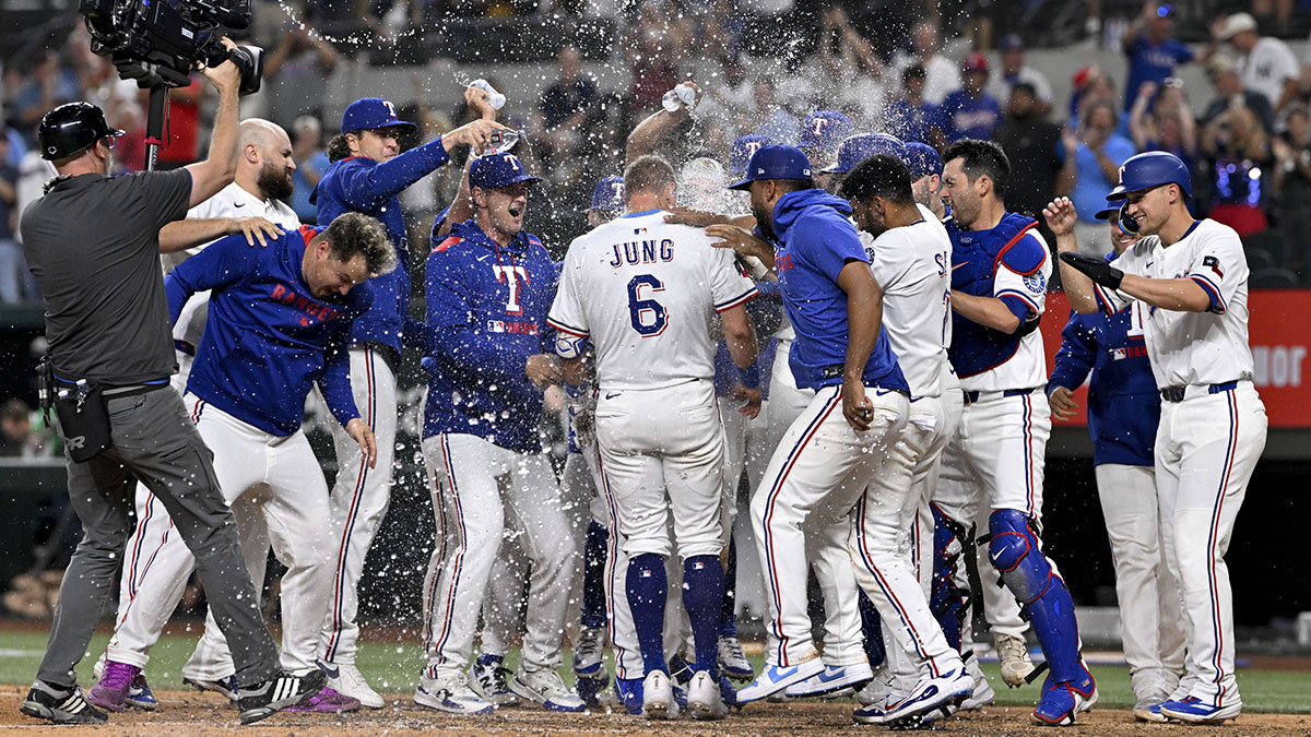 Rangers designated hitter Josh Jung (6) celebrates with his team