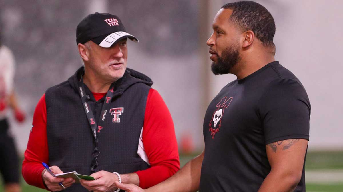Texas Tech general manager James Blanchard speaks with head coach Joey McGuire during spring practice, Tuesday, April 1, 2025, at the Womble Football Center.