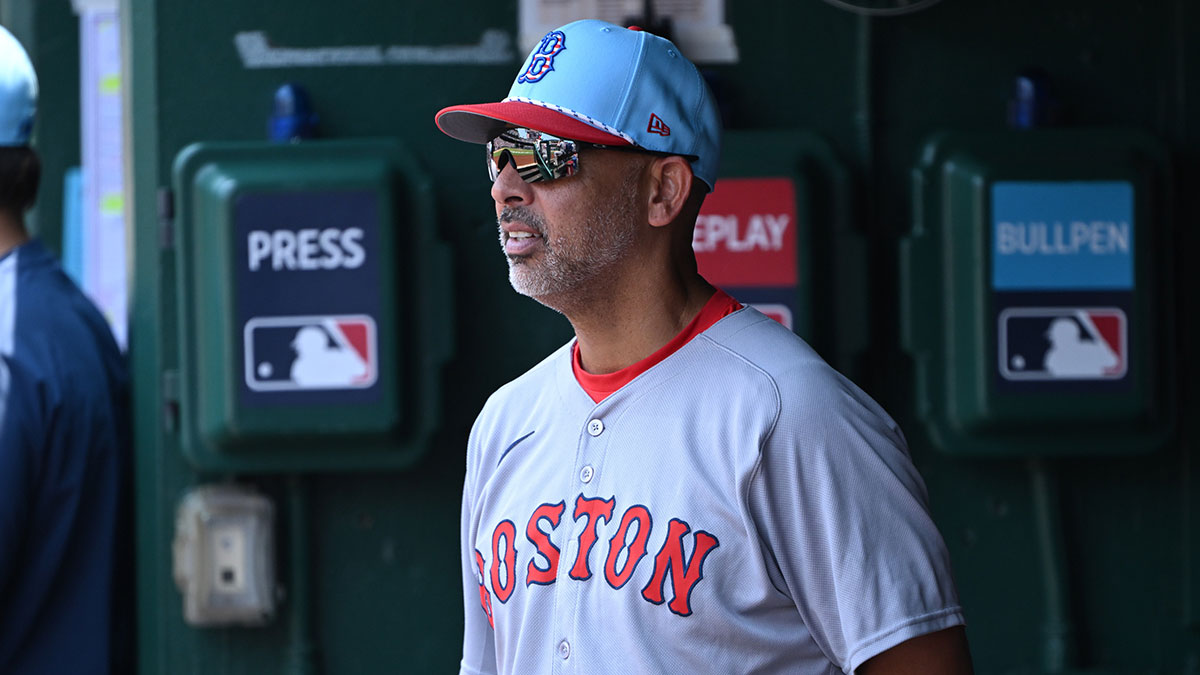 Boston Red Sox manager Alex Cora (13) stands in the dugout during the eighth inning of a game against the Washington Nationals at Nationals Park. 
