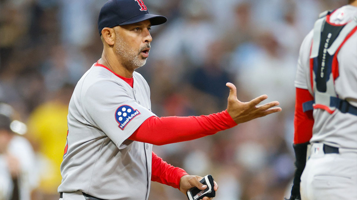 Boston Red Sox manager Alex Cora (13) makes a pitching change during the fifth inning against the San Diego Padres at Petco Park.