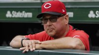 Cincinnati Reds manager Terry Francona (77) in the dugout before the game against the Chicago Cubs at Wrigley Field.