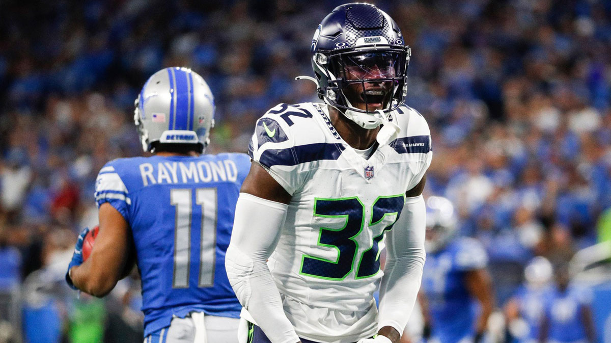 Seattle Seahawks safety Jerrick Reed II (32) celebrates a play against Detroit Lions during the first half at Ford Field in Detroit on Sunday, Sept. 17, 2023.