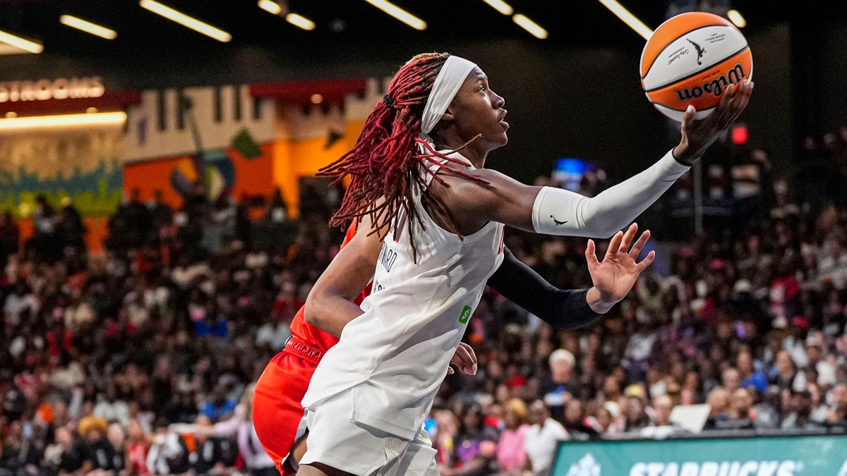 Atlanta Dream guard Rhyne Howard (10) shoots at the basket against the Las Vegas Aces during the second half at Gateway Center Arena at College Park.