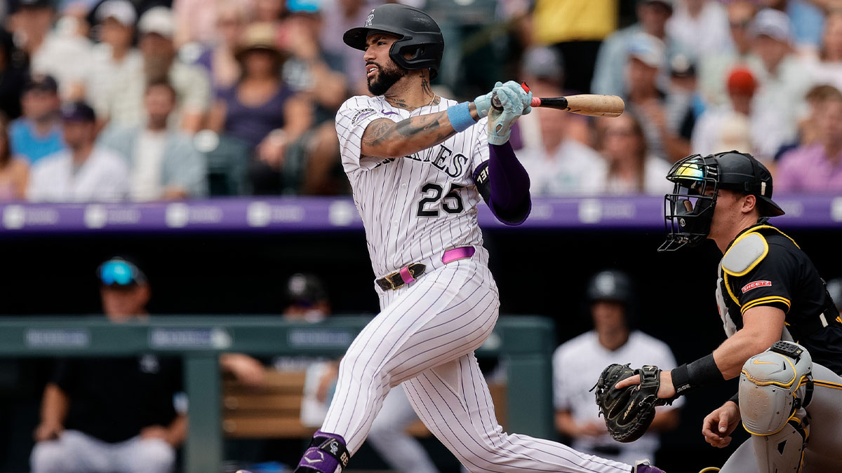 Colorado Rockies first baseman Warming Bernabel (25) watches his ball on a double in the fourth inning against the Colorado Rockies at Coors Field.