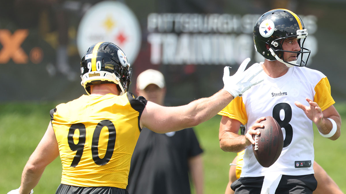 Pittsburgh Steelers defensive end T.J. Watt (90) pressures quarterback Aaron Rodgers (8) during training camp at Saint Vincent College.