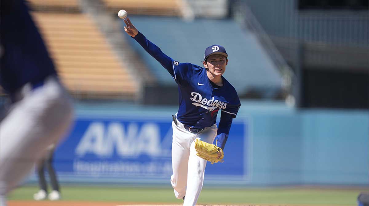 Los Angeles Dodgers pitcher Roki Sasaki (11) throws before the game against the Toronto Blue Jays at Dodger Stadium.