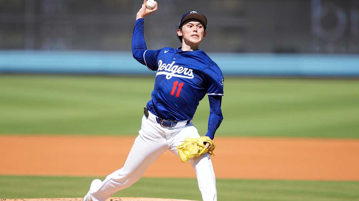 Aug 8, 2025; Los Angeles, California, USA; Los Angeles Dodgers pitcher Roki Sasaki (11) throws before the game against the Toronto Blue Jays at Dodger Stadium.