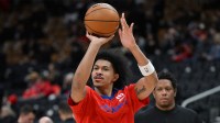 Detroit Pistons forward Ron Harper Jr. (13) shoots the ball during warmups before tip off against the Toronto Raptors at Scotiabank Arena.