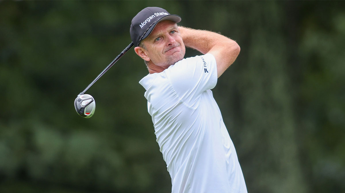 Justin Rose plays his shot from the third tee during the second round of the TOUR Championship golf tournament.