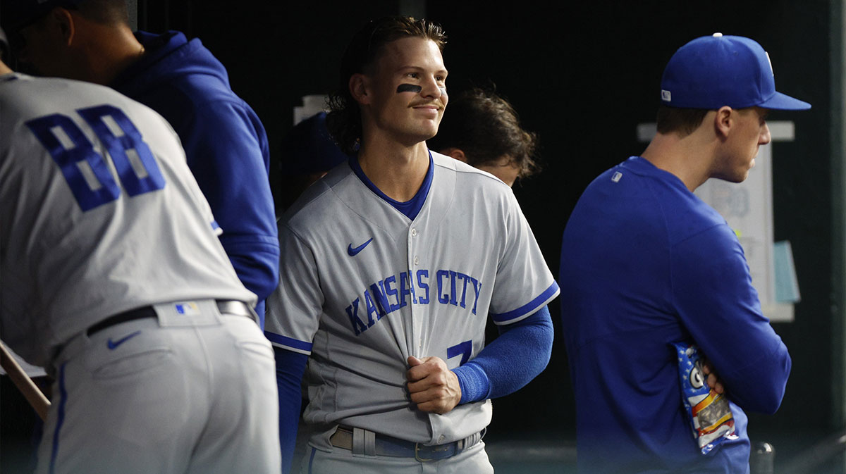 Kansas City Royals infielder Bobby Witt Jr. (7) smiles from the dugout at Comerica Park.