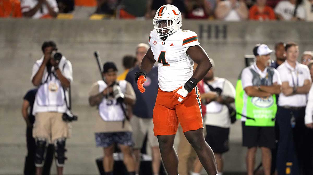 Miami Hurricanes defensive lineman Rueben Bain Jr. (4) reacts after a tackle against the California Golden Bears during the first quarter at California Memorial Stadium.