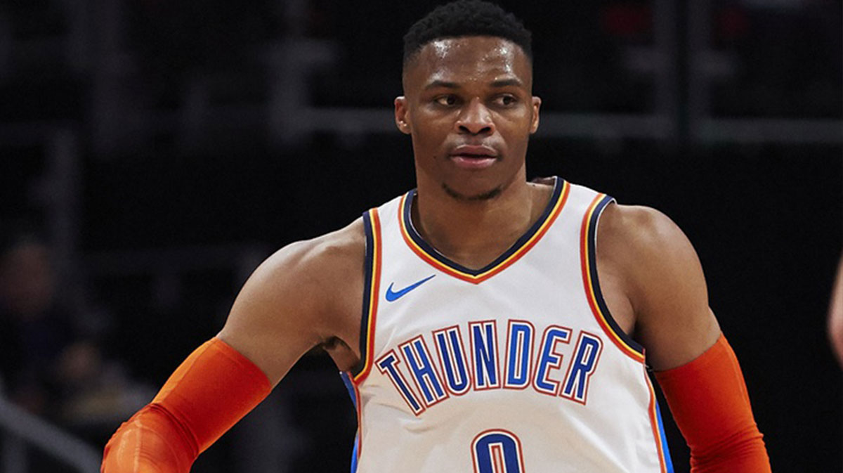 Oklahoma City Thunder guard Russell Westbrook (0) celebrates a three point basket in the first half against the Detroit Pistons at Little Caesars Arena.
