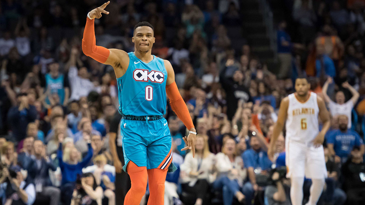 Oklahoma City Thunder guard Russell Westbrook (0) reacts after scoring a three point basket against the Atlanta Hawks during the second quarter at Chesapeake Energy Arena.