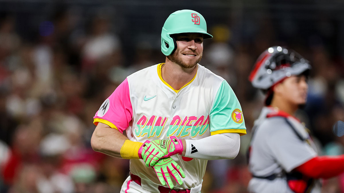 San Diego Padres pinch hitter Ryan O'Hearn (32) is hit by a pitch during the sixth inning against the St. Louis Cardinals at Petco Park.
