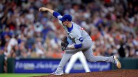 Chicago Cubs pitcher Ryan Pressly (55) delivers a pitch against the Houston Astros during the seventh inning at Daikin Park.