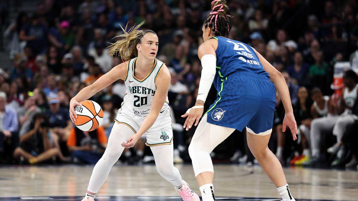 New York Liberty guard Sabrina Ionescu (20) works around Minnesota Lynx guard Kayla McBride (21) during the first quarter at Target Center. 