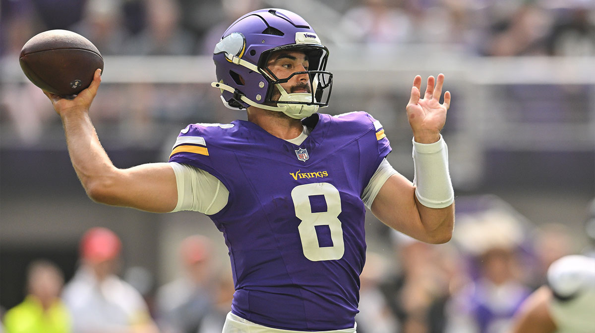 Minnesota Vikings quarterback Sam Howell (8) throws a pass against the Houston Texans during the second quarter at U.S. Bank Stadium.