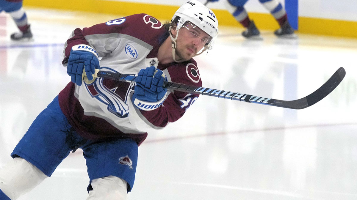 Colorado Avalanche defenseman Samuel Girard (49) shoots the puck during during warm up before a game against the Toronto Maple Leafs at Scotiabank Arena.