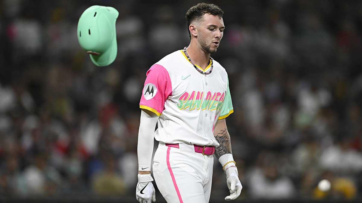 San Diego Padres center fielder Jackson Merrill (3) throws his helmet after grounding out during the fifth inning against the Boston Red Sox at Petco Park.