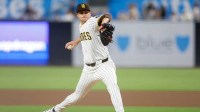 San Diego Padres relief pitcher Mason Miller (22) throws a pitch during the eighth inning against the Boston Red Sox at Petco Park.