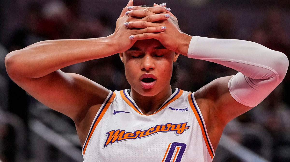 Phoenix Mercury forward Satou Sabally (0) holds her head Wednesday, July 30, 2025, during the game at Gainbridge Fieldhouse in Indianapolis. The Indiana Fever defeated the Phoenix Mercury, 107-101.