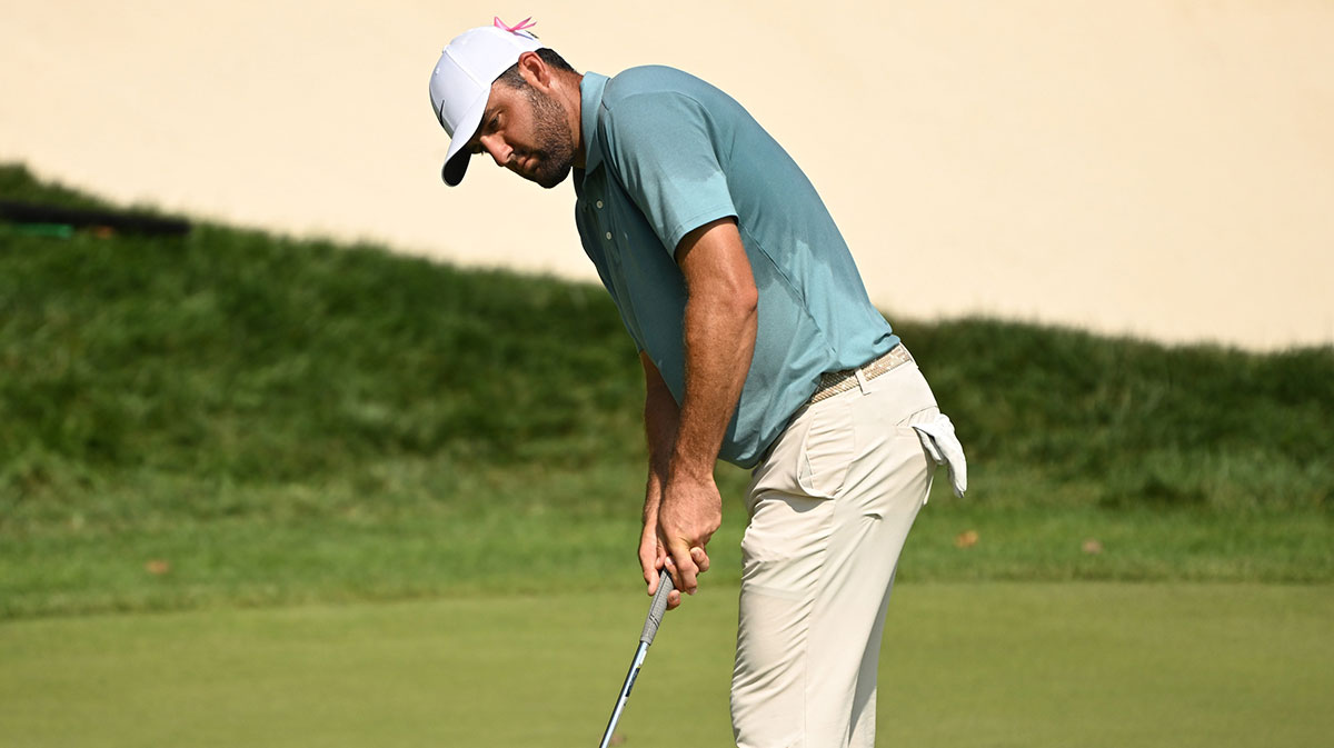 Scottie Scheffler putts on the ninth hole during the final round of the BMW Championship golf tournament.