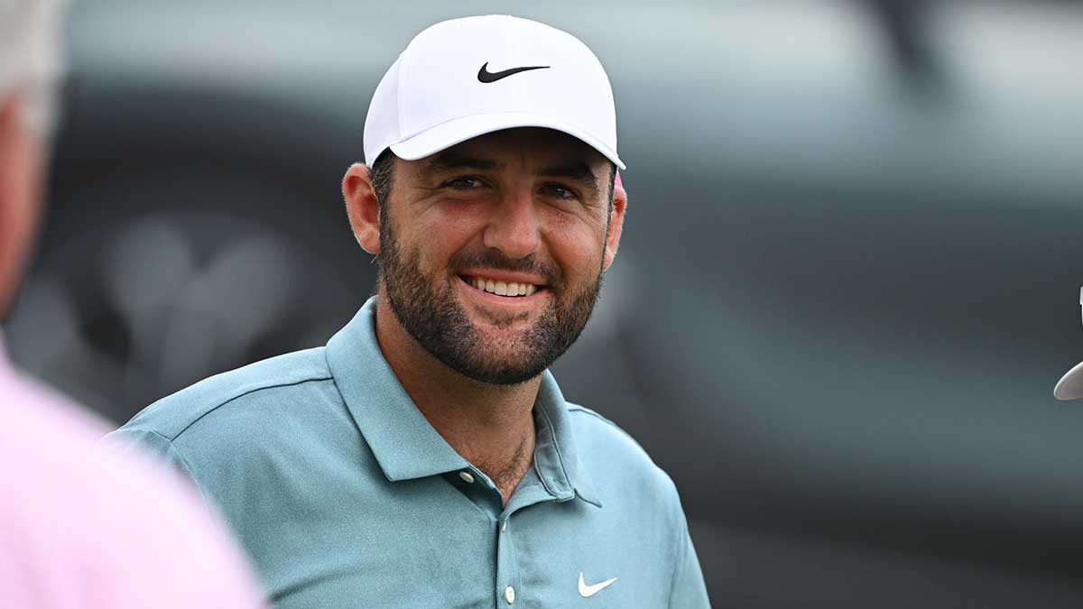 Scottie Scheffler smiles after winning the BMW Championship golf tournament