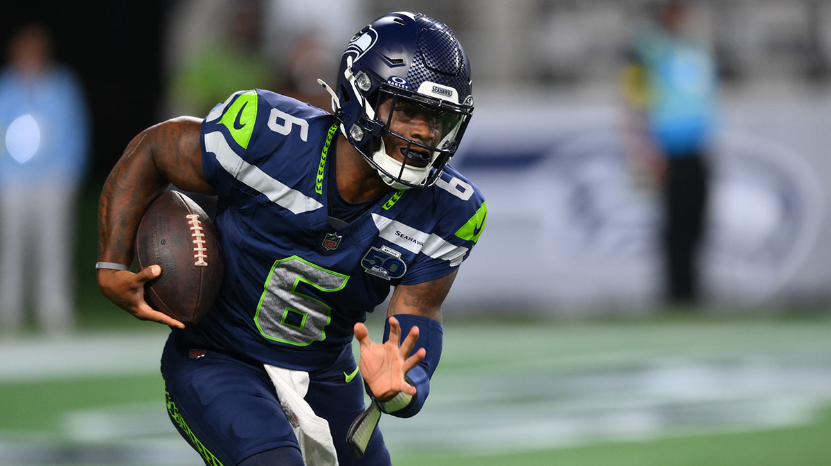 Seattle Seahawks quarterback Jalen Milroe (6) carries the ball against the Las Vegas Raiders during the second half at Lumen Field.