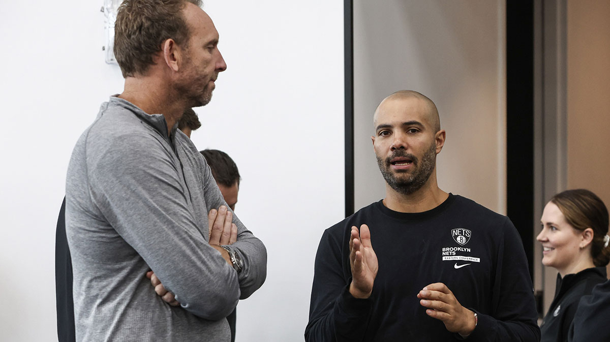 Brooklyn Nets General Manager Sean Marks (left) speaks to head coach Jordi Fernandez (right) during media day at HSS Training Center.