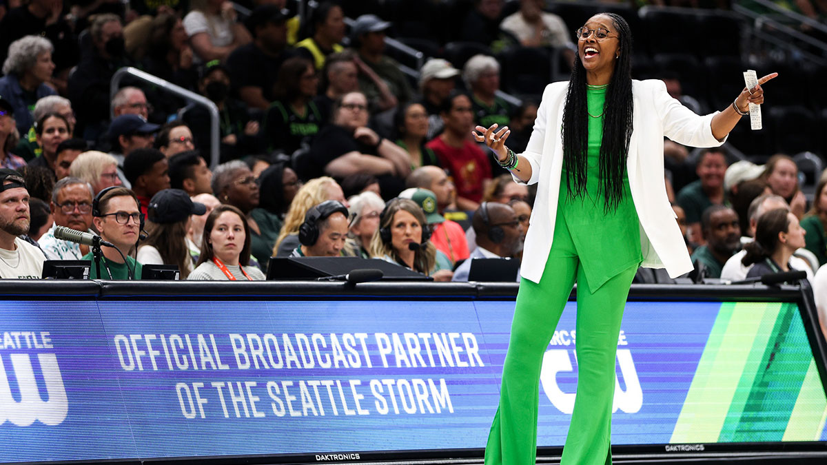 Head coach Noelle Quinn of the Seattle Storm reacts to the referees call during the second half against the Minnesota Lynx