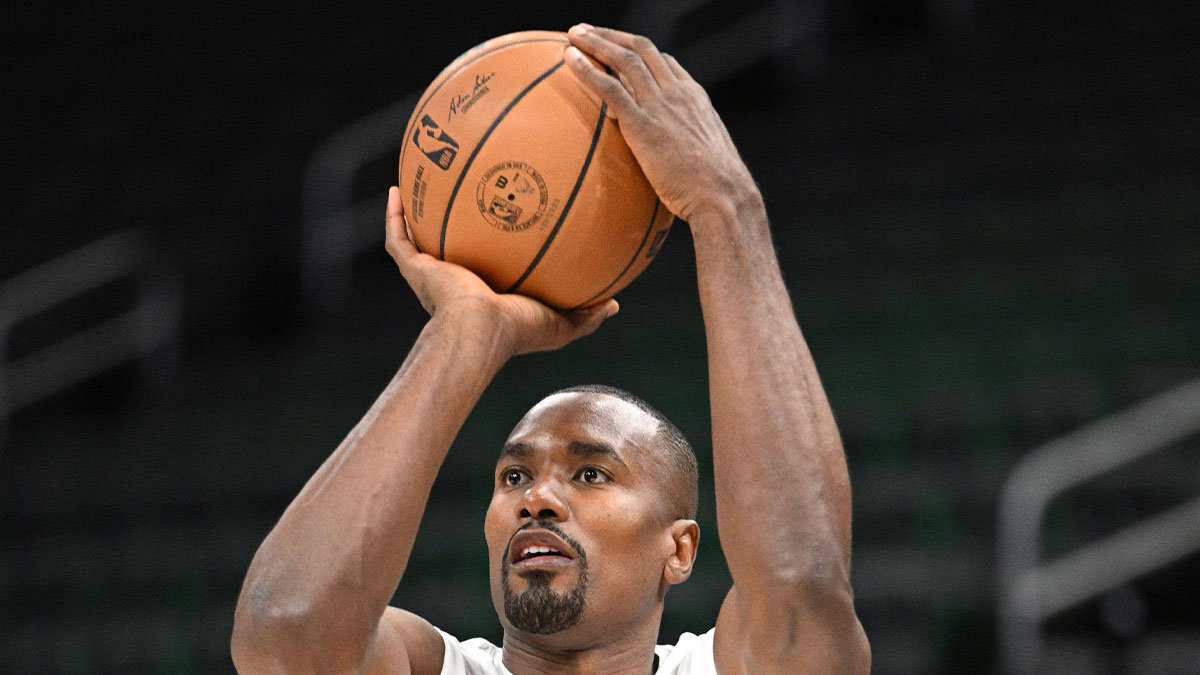 Milwaukee Bucks forward Serge Ibaka (25) shoots during pregame warmups at Fiserv Forum.