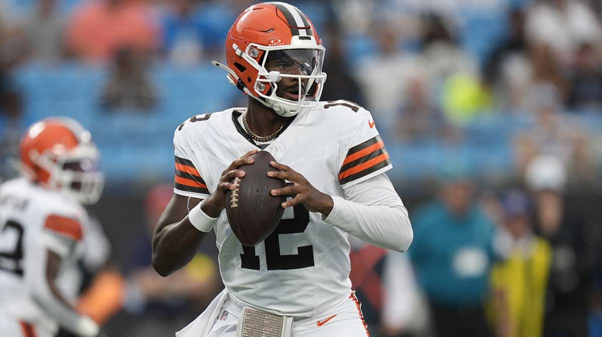 Cleveland Browns quarterback Shedeur Sanders (12)j drops back to pass against the Carolina Panthers during the first quarter at Bank of America Stadium.