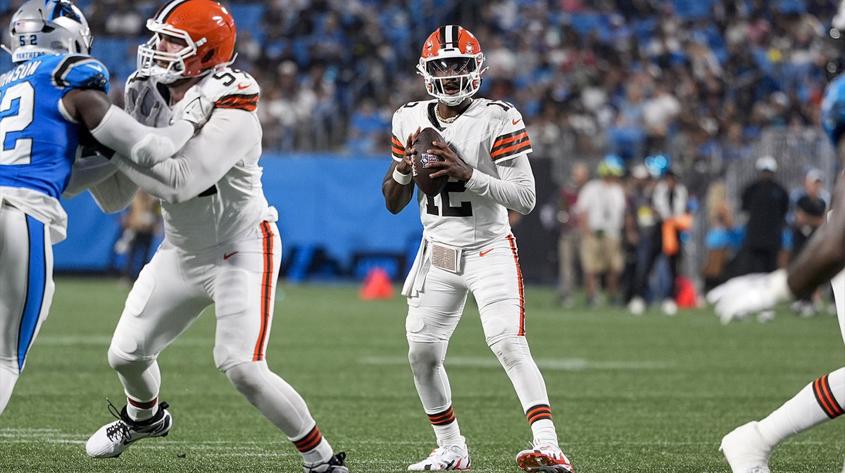 Cleveland Browns quarterback Shedeur Sanders (12) looks downfield for a receiver during the second half against the Carolina Panthers at Bank of America Stadium.