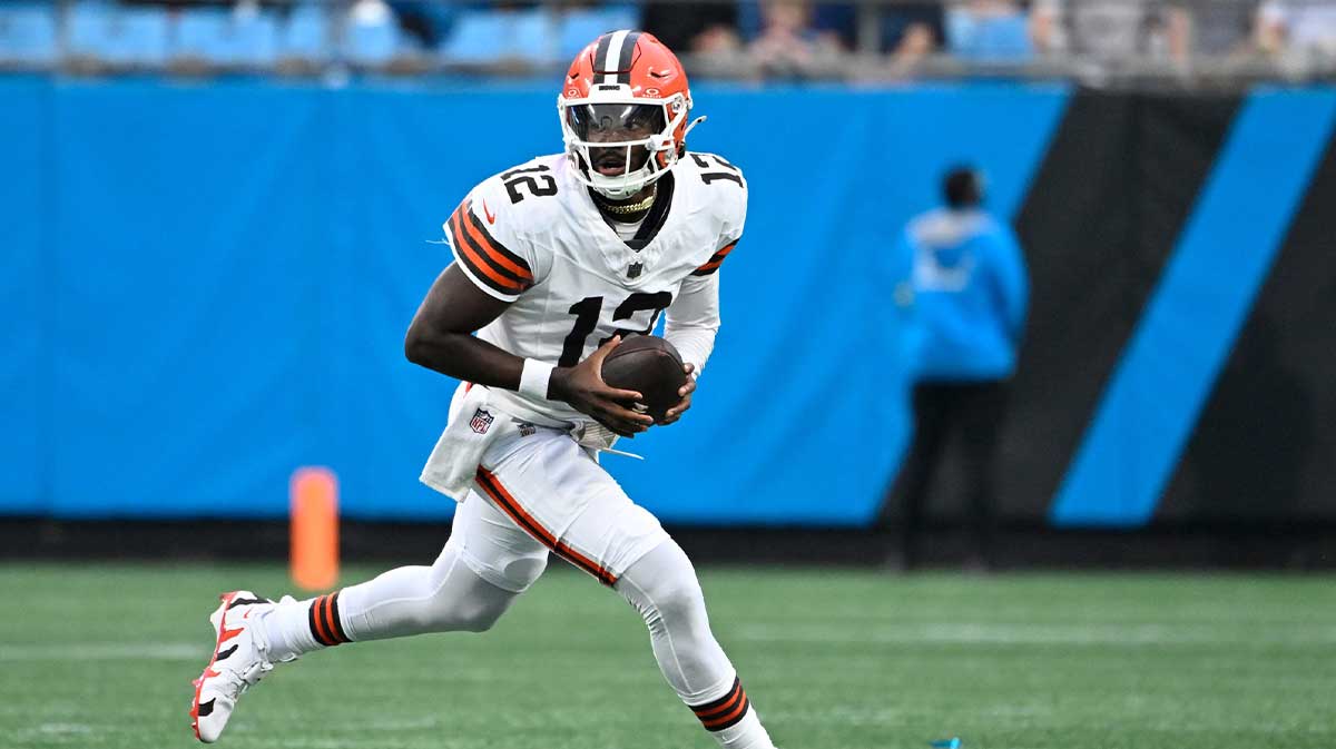 Cleveland Browns quarterback Shedeur Sanders (12) with the ball in the first quarter at Bank of America Stadium.