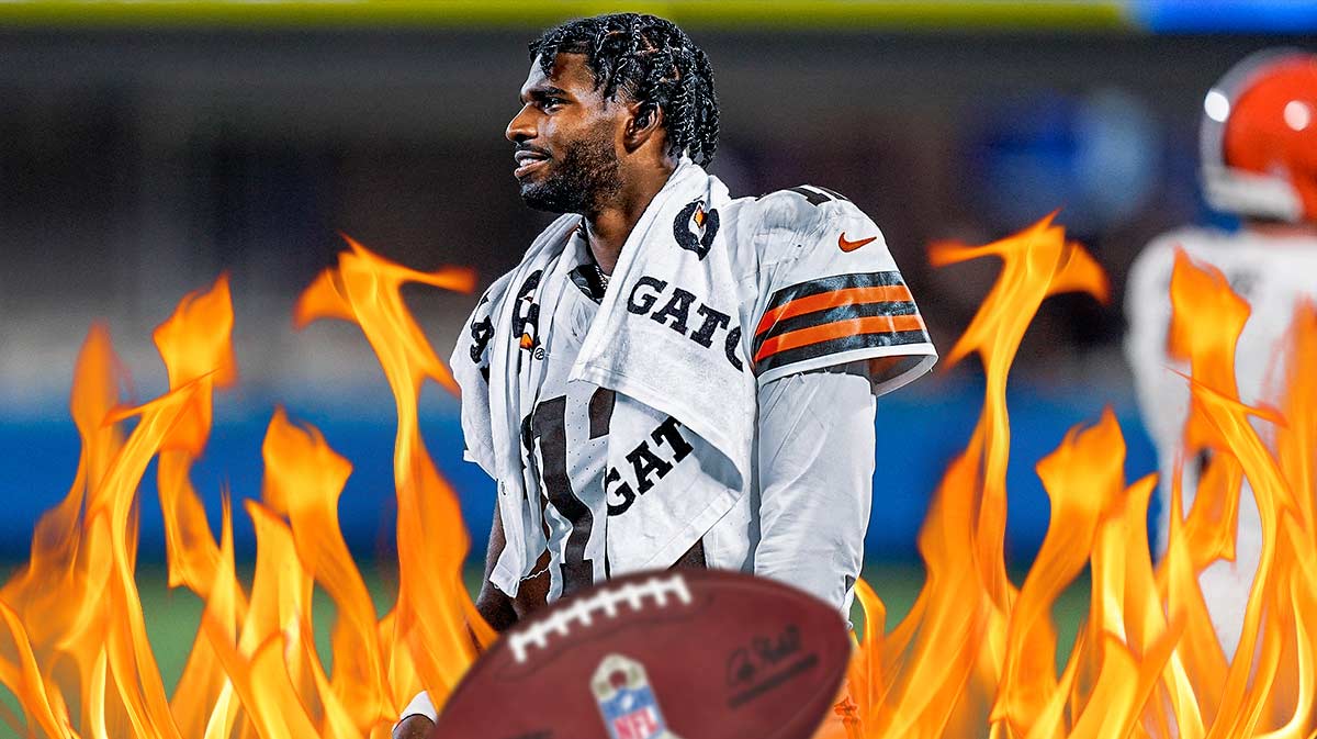 Cleveland Browns star Shedeur Sanders with fire around him in front of Huntington Bank Field.