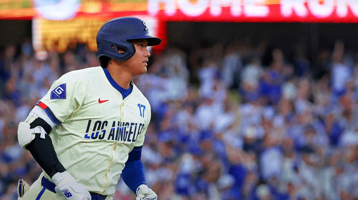 Los Angeles Dodgers designated hitter Shohei Ohtani (17) hits a home run during the fifth inning against Toronto Blue Jays starting pitcher Chris Bassitt (40) at Dodger Stadium.