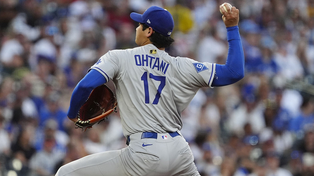 Los Angeles Dodgers two-way player Shohei Ohtani (17) delivers a pitch in third inning against the Colorado Rockies at Coors Field. 