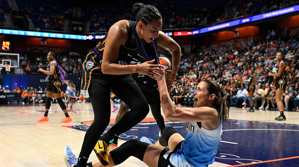Sun guard Bria Hartley (14) and Chicago Sky guard Rebecca Allen (9) draw technical fouls and ejections from the game during the first half at Mohegan Sun Arena with Sky head coach Tyler Marsh in the background